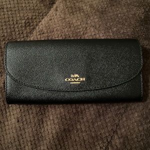 Elegant Coach envelope wallet